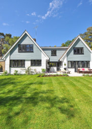 This is a picture of a beautiful landscaped yard that NWA Brothers Tree Service has trimmed the trees.